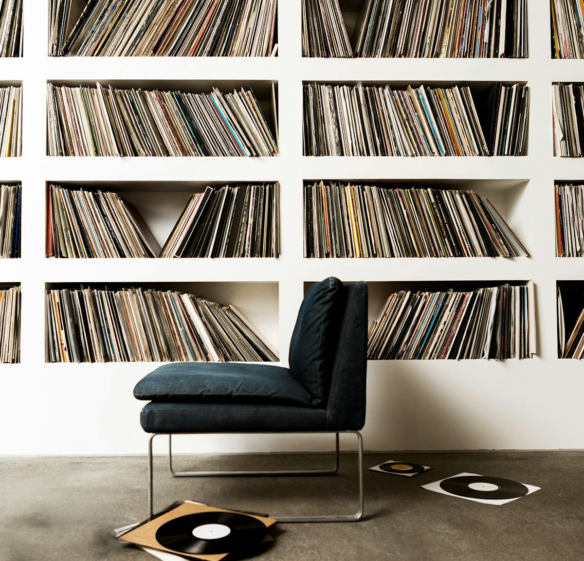 Chair in front of record collection mobile