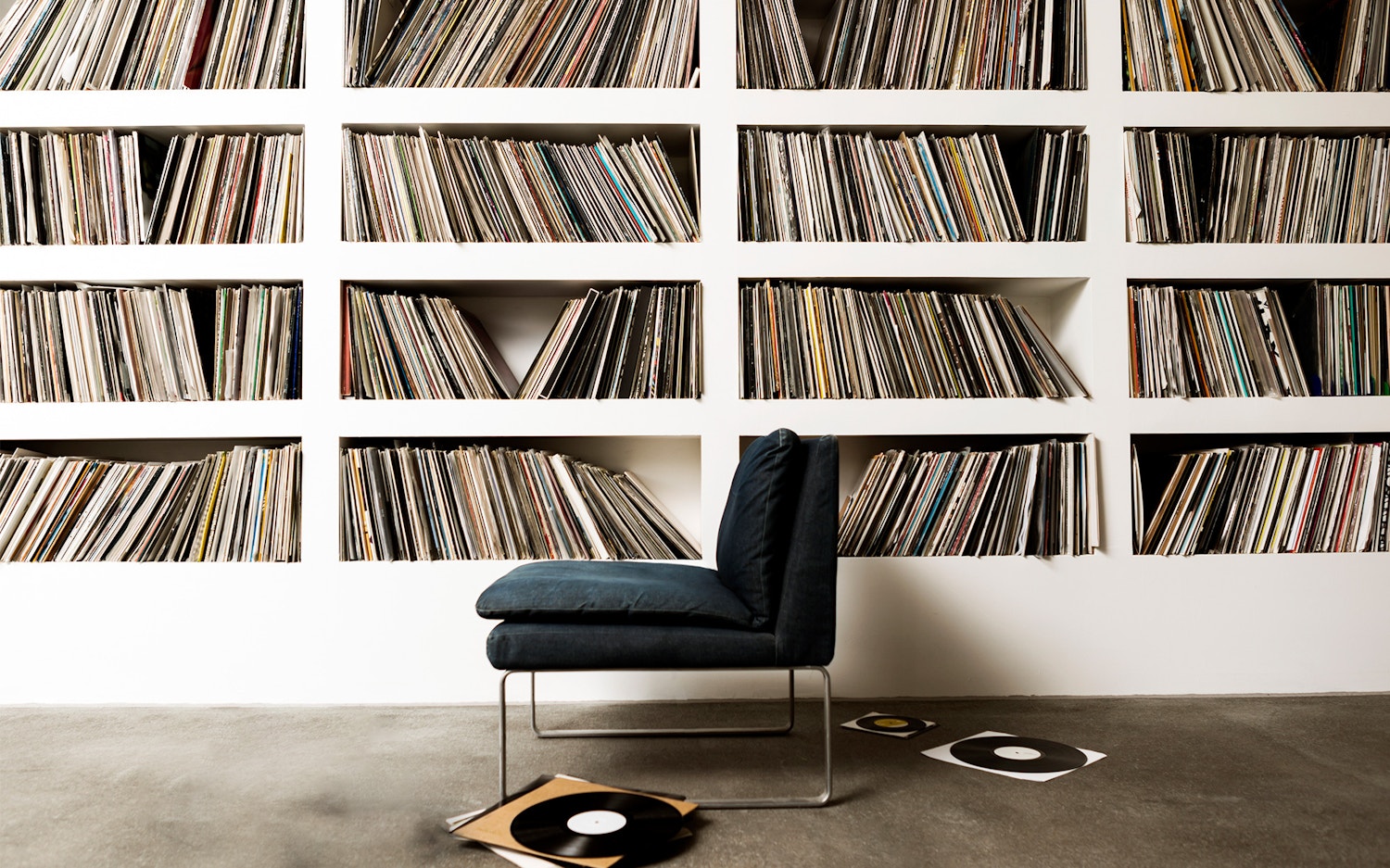 Chair in front of record collection